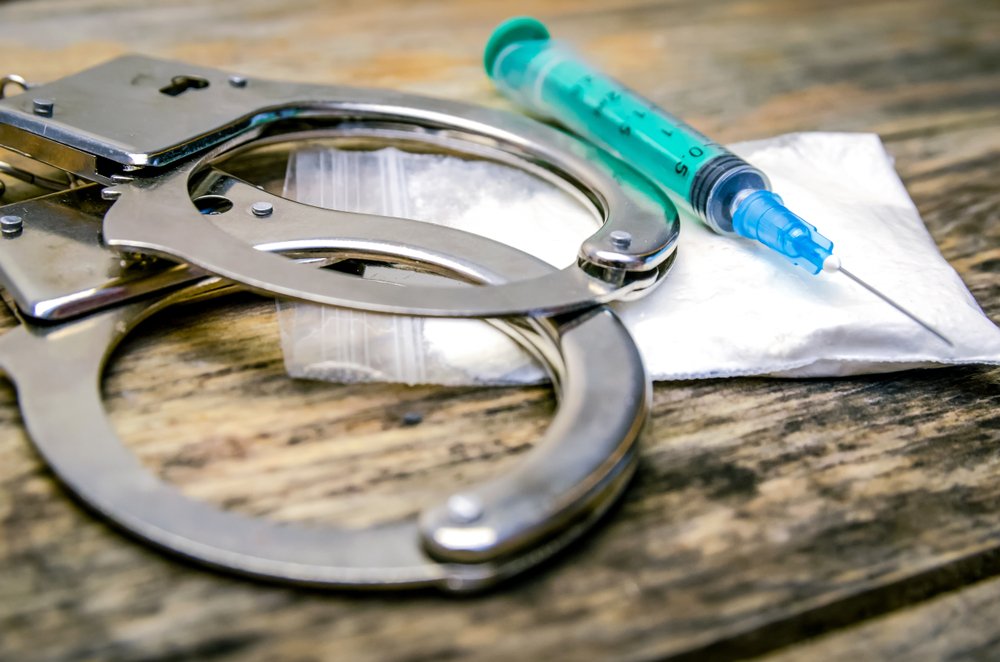 Hand cuffs and drugs